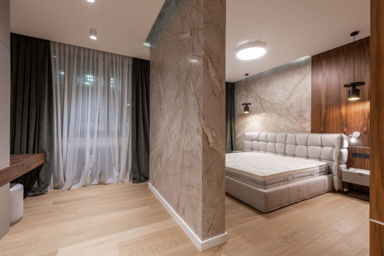 Interior modern 1 bedroom flat with bright living area, sleek kitchen, and cozy bedroom decor.