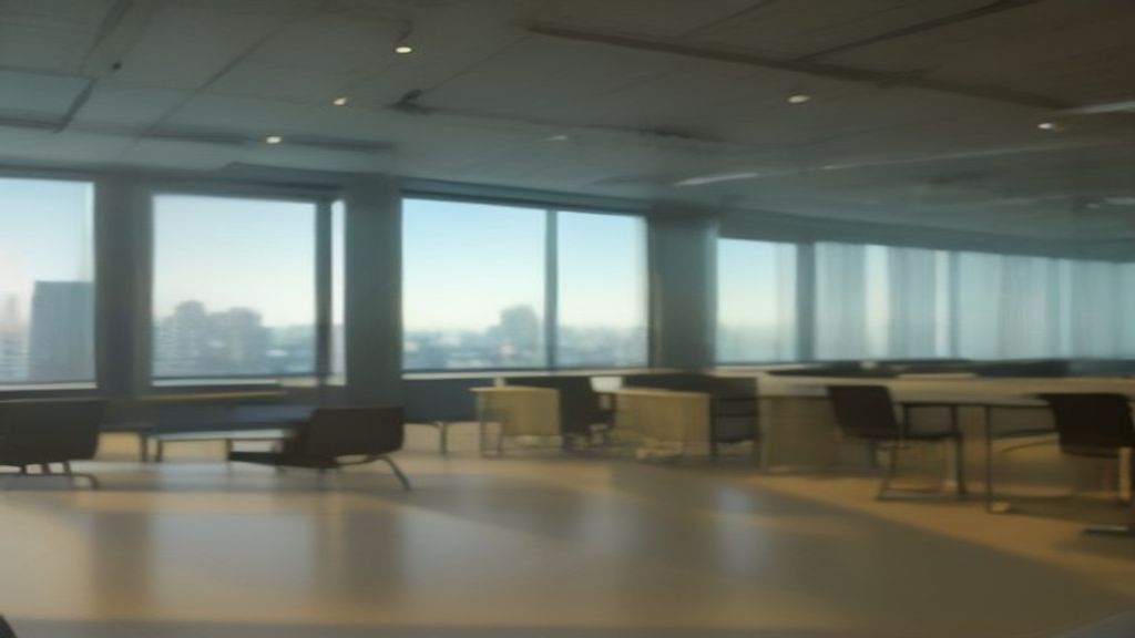 Modern serviced office for rent with open workspace, glass walls, and ergonomic furniture.